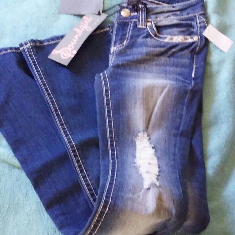 Jeans size 0 (zero) new condition distressed blue